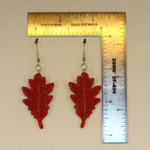 Oak leaf earrings in warm fall colors.