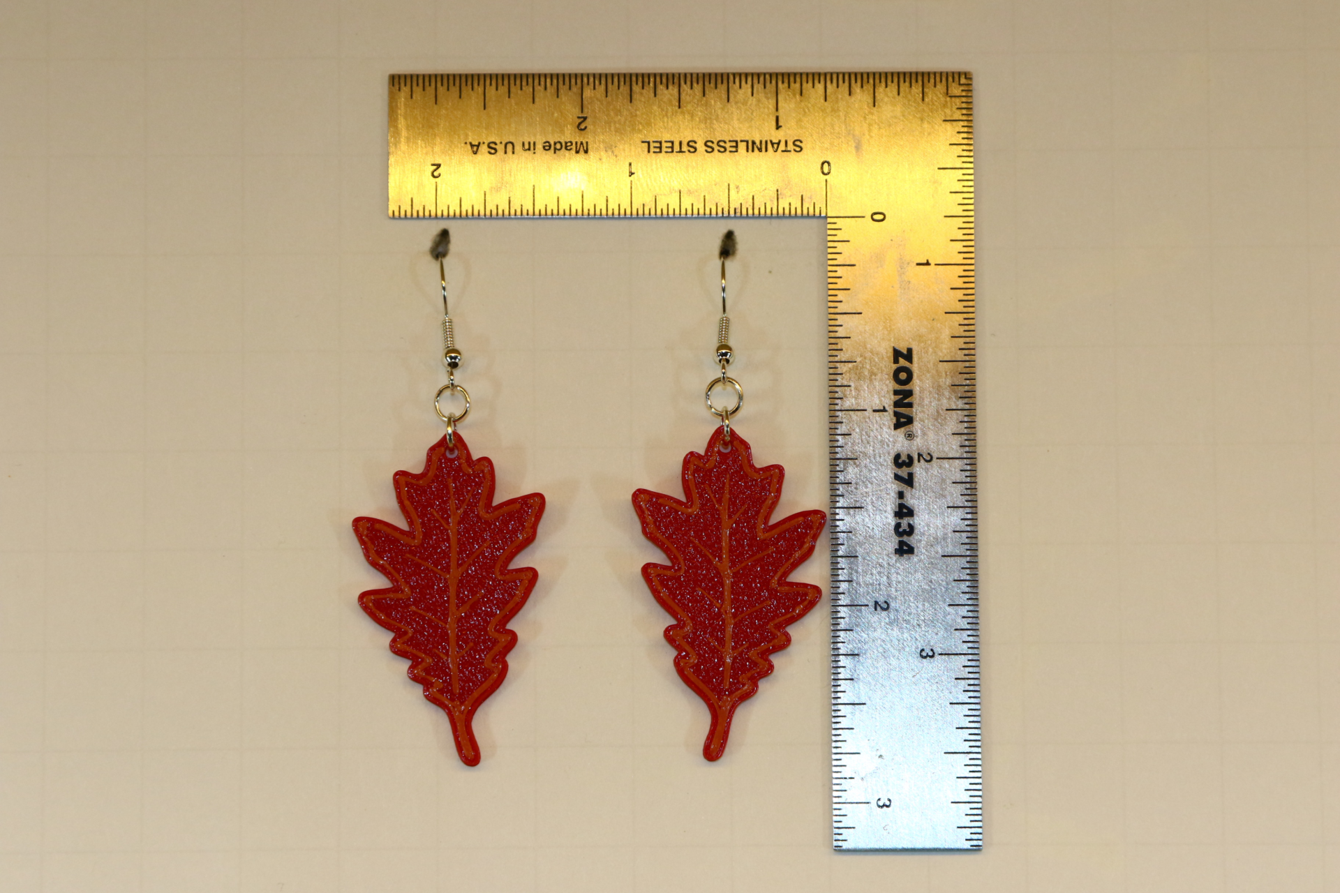 Oak leaf earrings in warm fall colors.