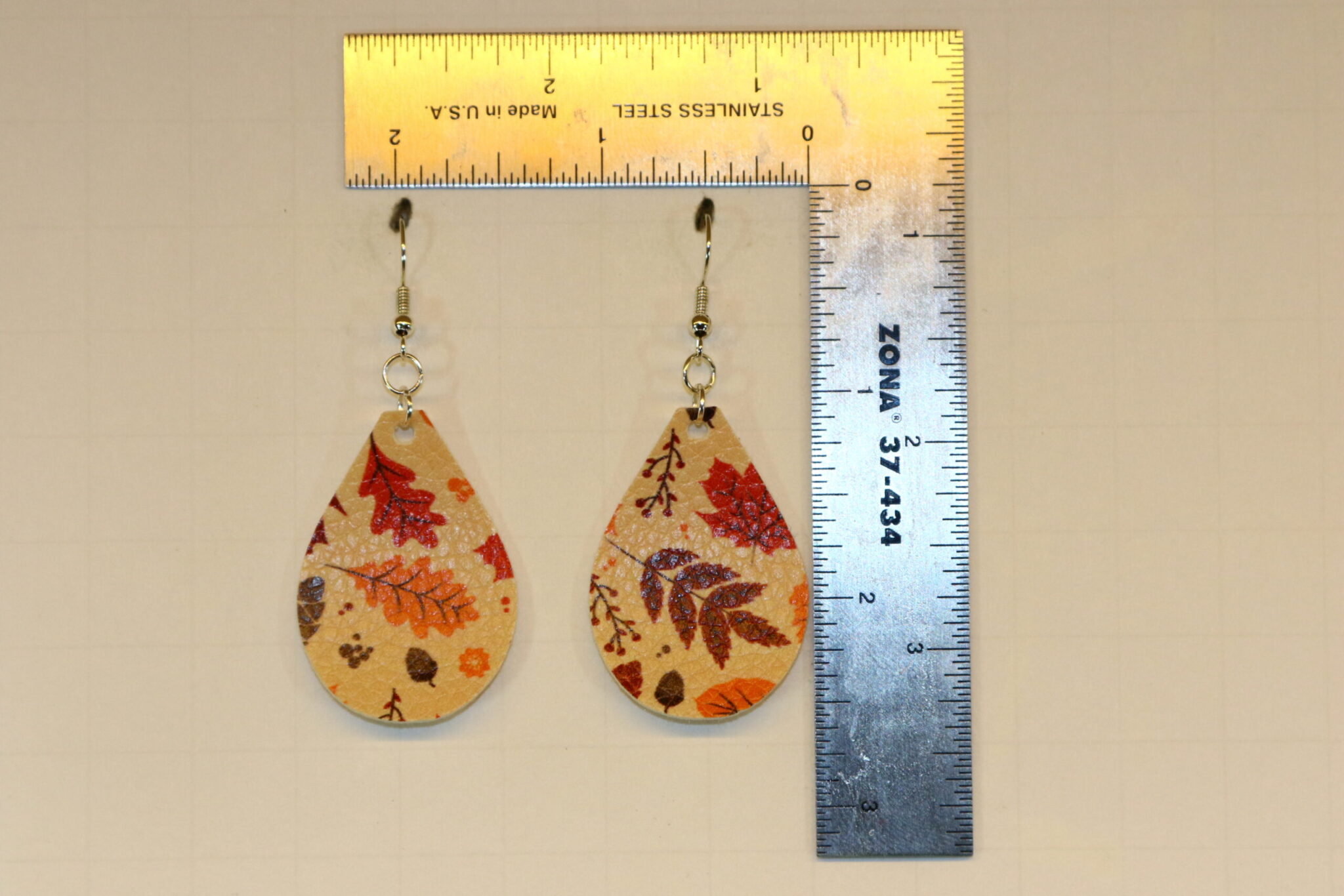 faux leather earrings with autumn leaf pattern
