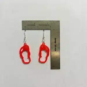 Flip flop-shaped earrings with beachy boho style.