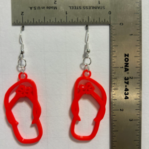 Flip flop-shaped earrings with beachy boho style.