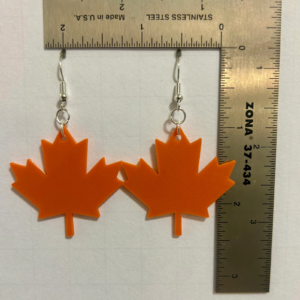 Maple leaf earrings with detailed leaf design and fall-inspired tones.Maple leaf earrings with detailed leaf design and fall-inspired tones.