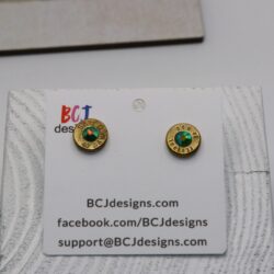 bullet slice earring with a gem in the center