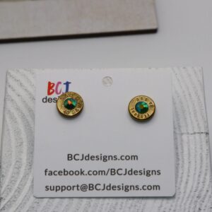 bullet slice earring with a gem in the center