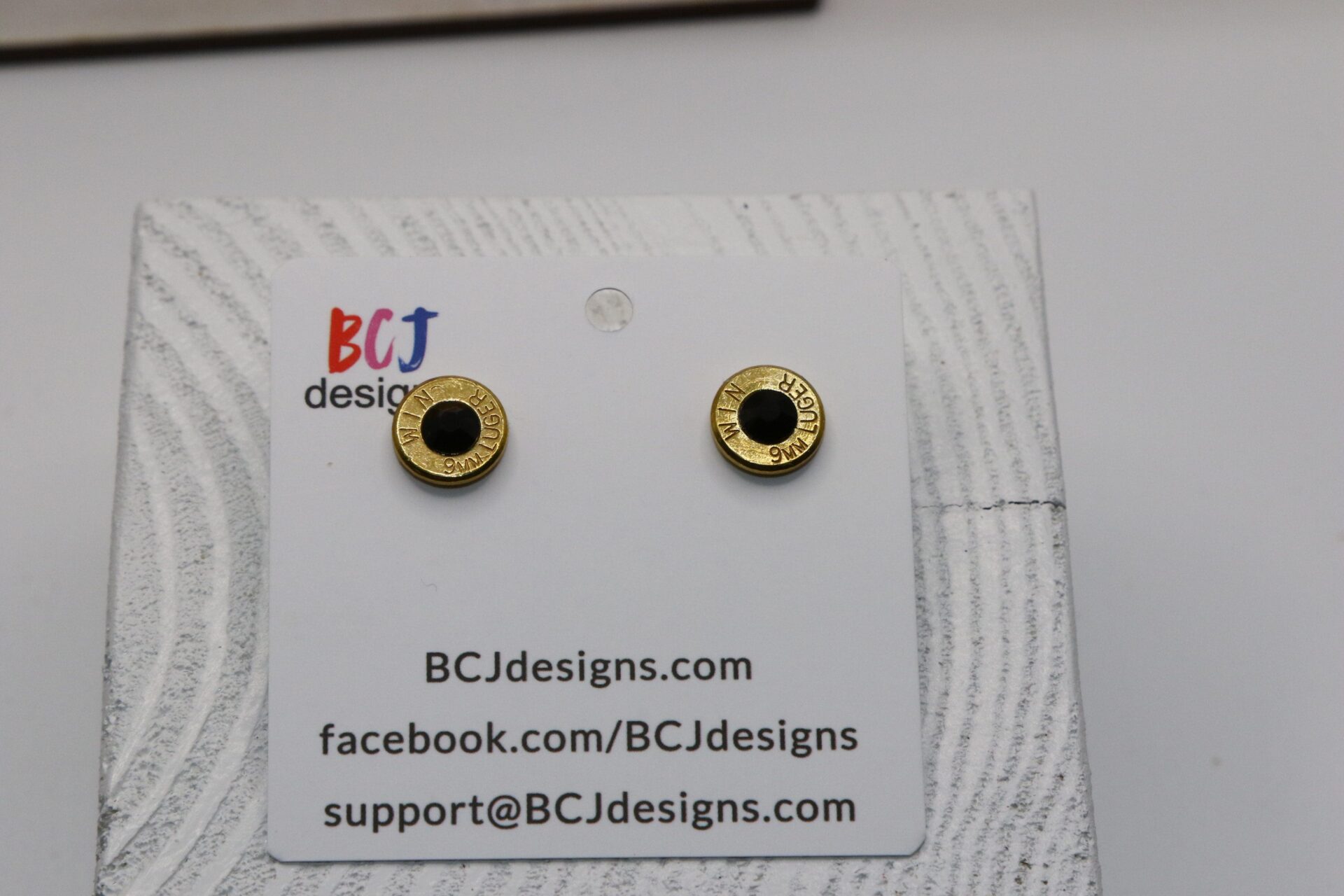 bullet slice earring with gem inside