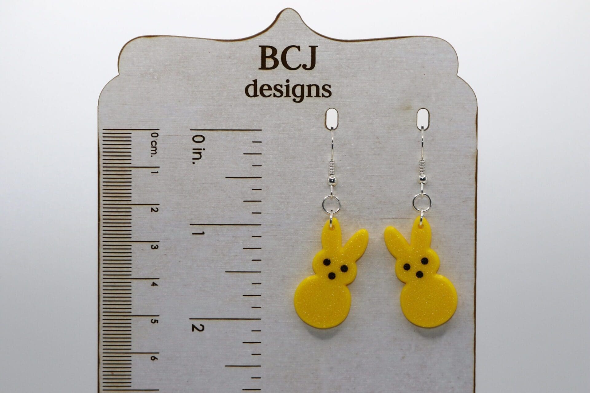 Bunny Peep-shaped earrings in bright pastel colors.