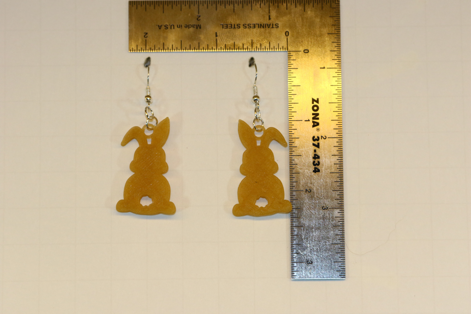 Bunny-shaped earrings in a cute spring design.