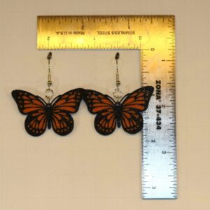 Butterfly earrings featuring detailed butterfly wings.