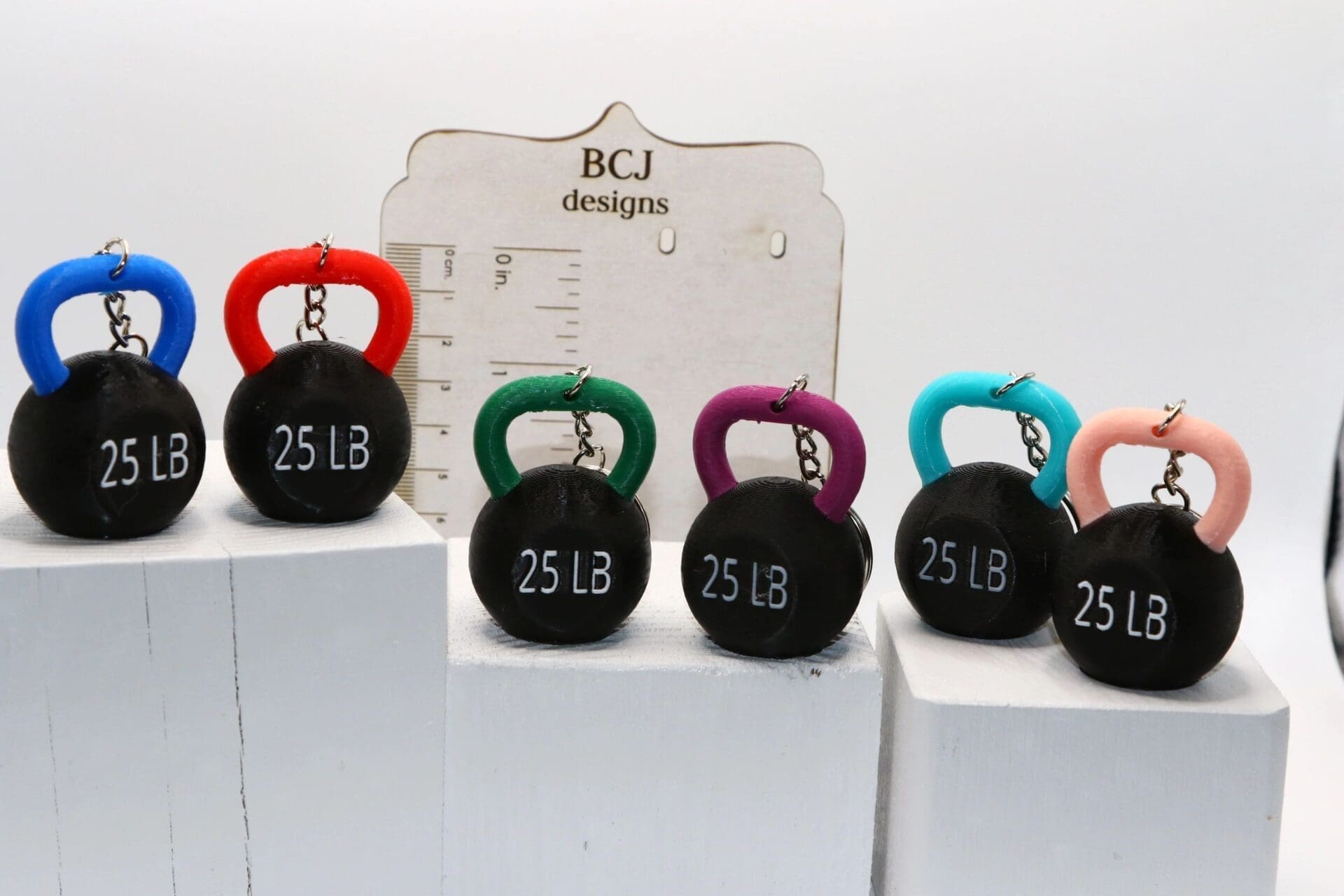 Mini kettlebell keychain with metallic finish