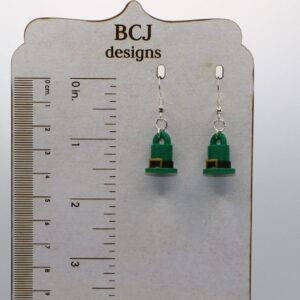 Pair of earrings shaped like green leprechaun top hats with gold buckles.
