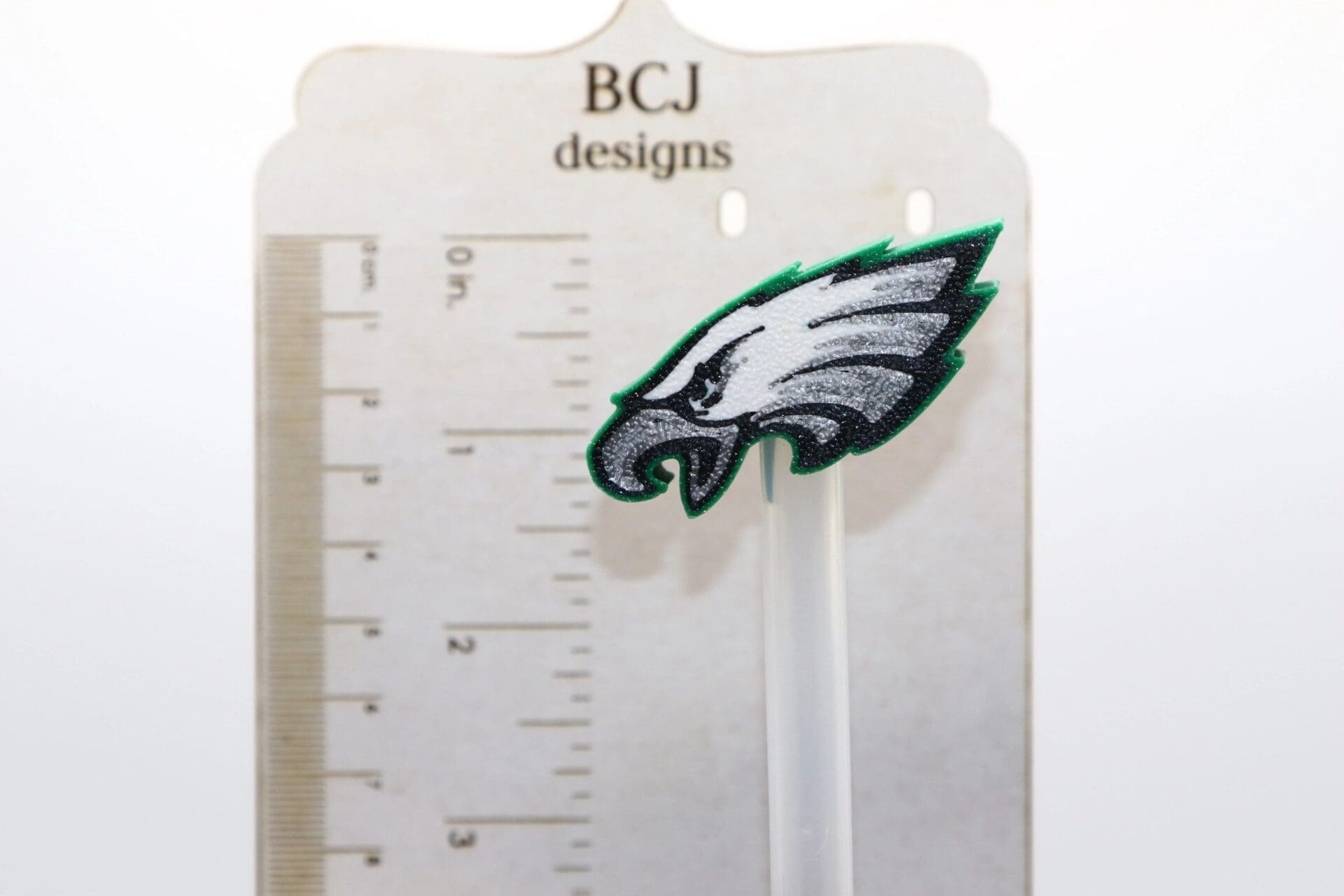 Philadelphia Eagles logo straw topper on a straw