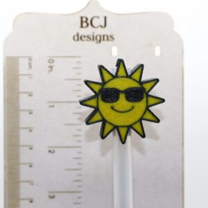 Sunshine straw topper with bright yellow sun design.