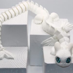 White Fury dragon fidget toy with detailed wings and tail.