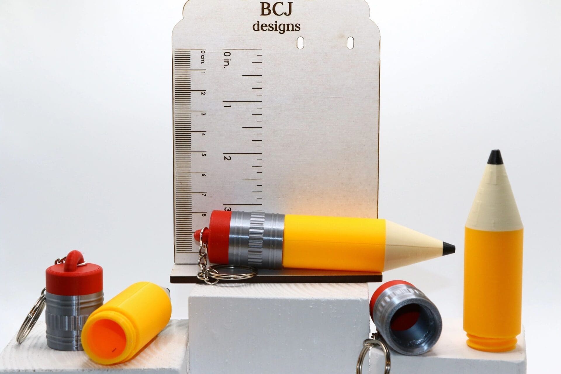 Pencil chapstick holder keychain in yellow and pink