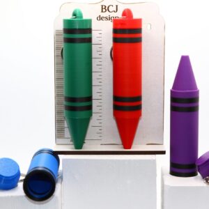 Crayon-shaped chapstick holder keychain in bright colorsCrayon-shaped chapstick holder keychain in bright colors