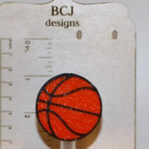 Basketball-shaped straw topper on a straw