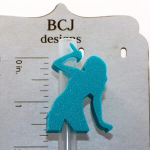 Taylor Swift silhouette straw topper with sleek outline.