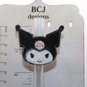 Kuromi straw topper with black hat and pink skull accent.