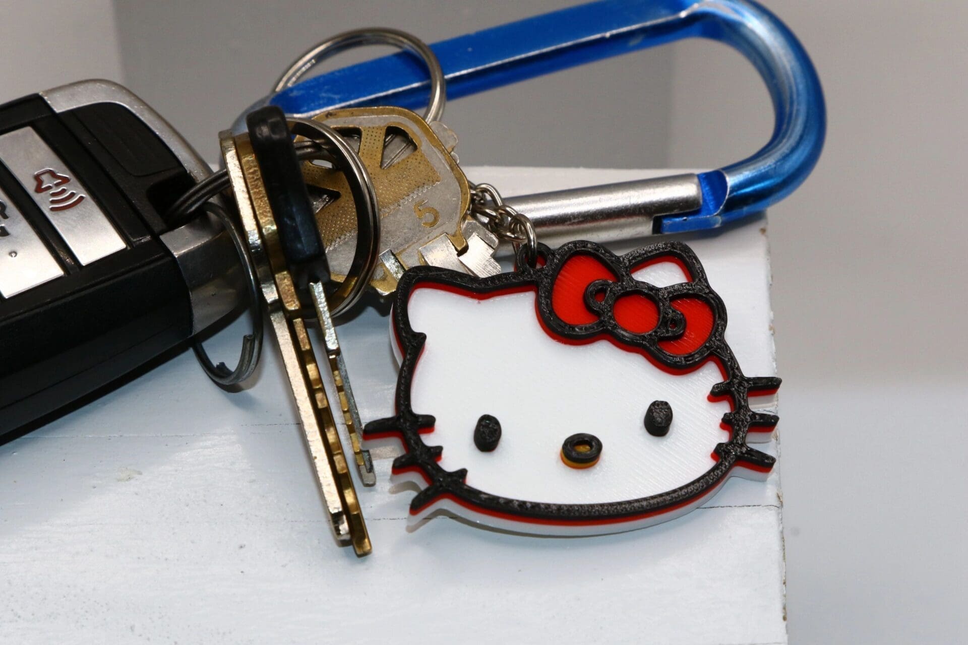 Hello Kitty keychain with red bow