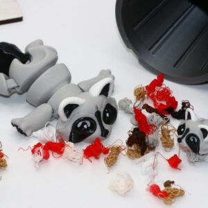 Trash Panda raccoon fidget toy with gray and black detailing.