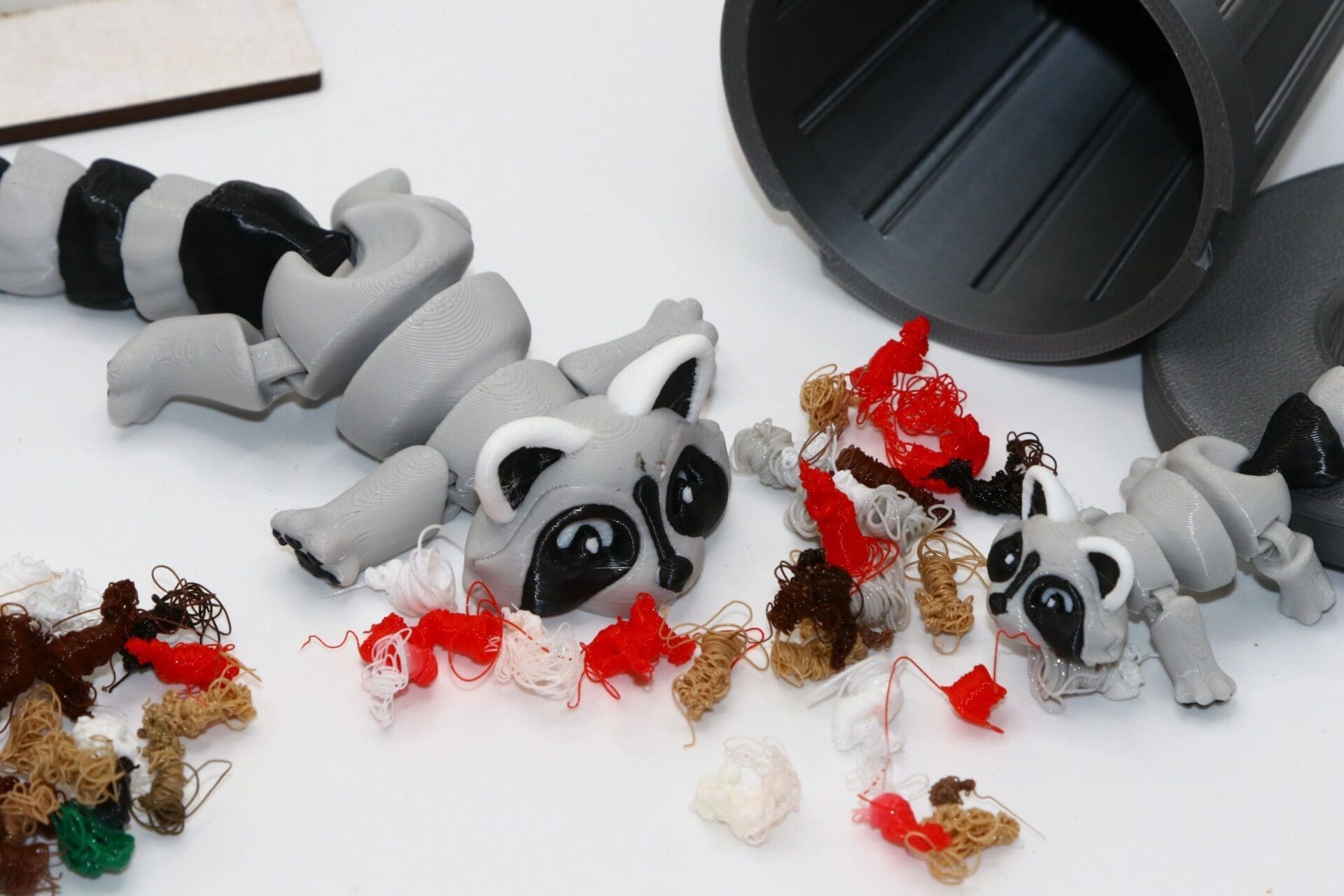 Trash Panda raccoon fidget toy with gray and black detailing.