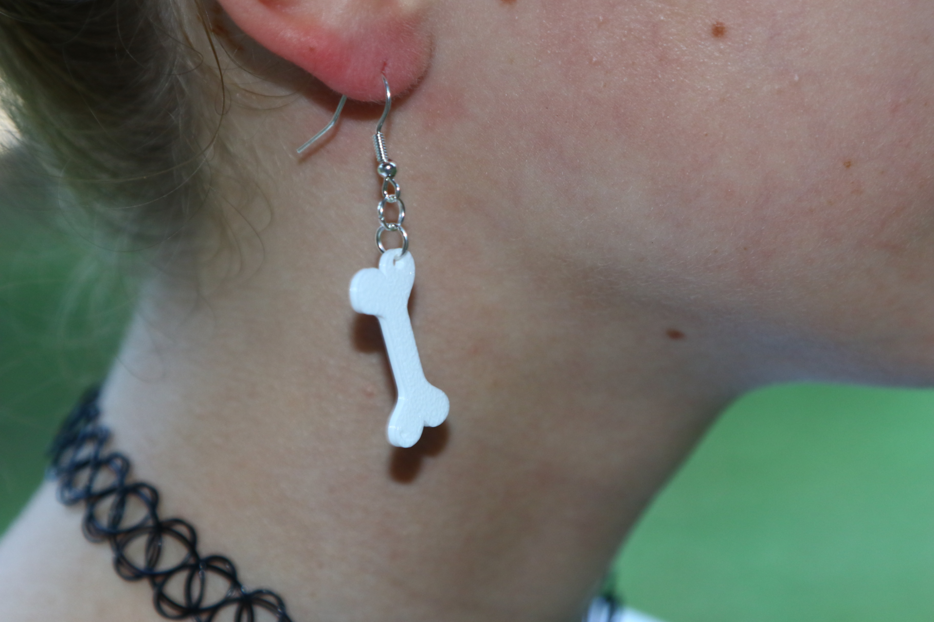 bone earring that looks like a bone
