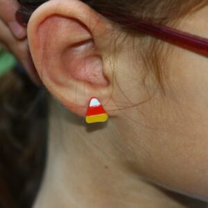 Candy corn stud earrings in traditional orange, yellow, and white colors