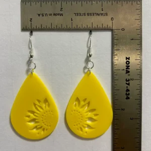 Teardrop sunflower earrings with detailed elongated design.