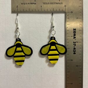 Bumble bee earrings featuring yellow and black bee design.