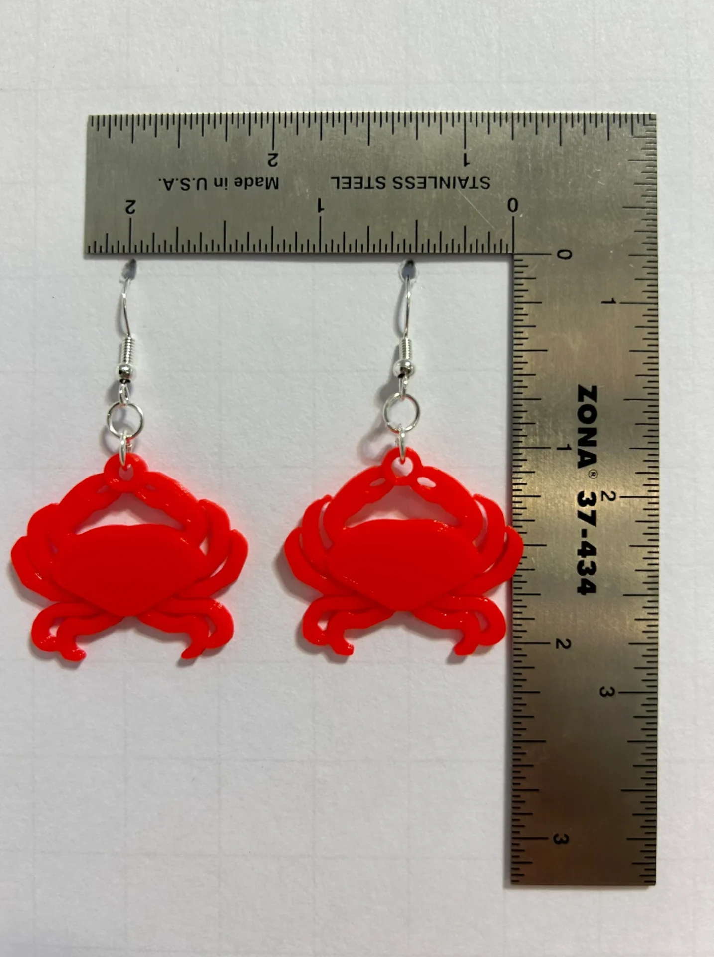 Crab earrings featuring detailed ocean-inspired design