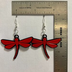 Dragonfly earrings featuring detailed dragonfly design.