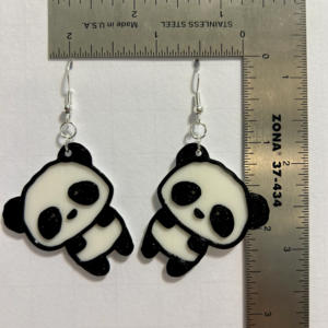 Panda earrings featuring black-and-white panda design.