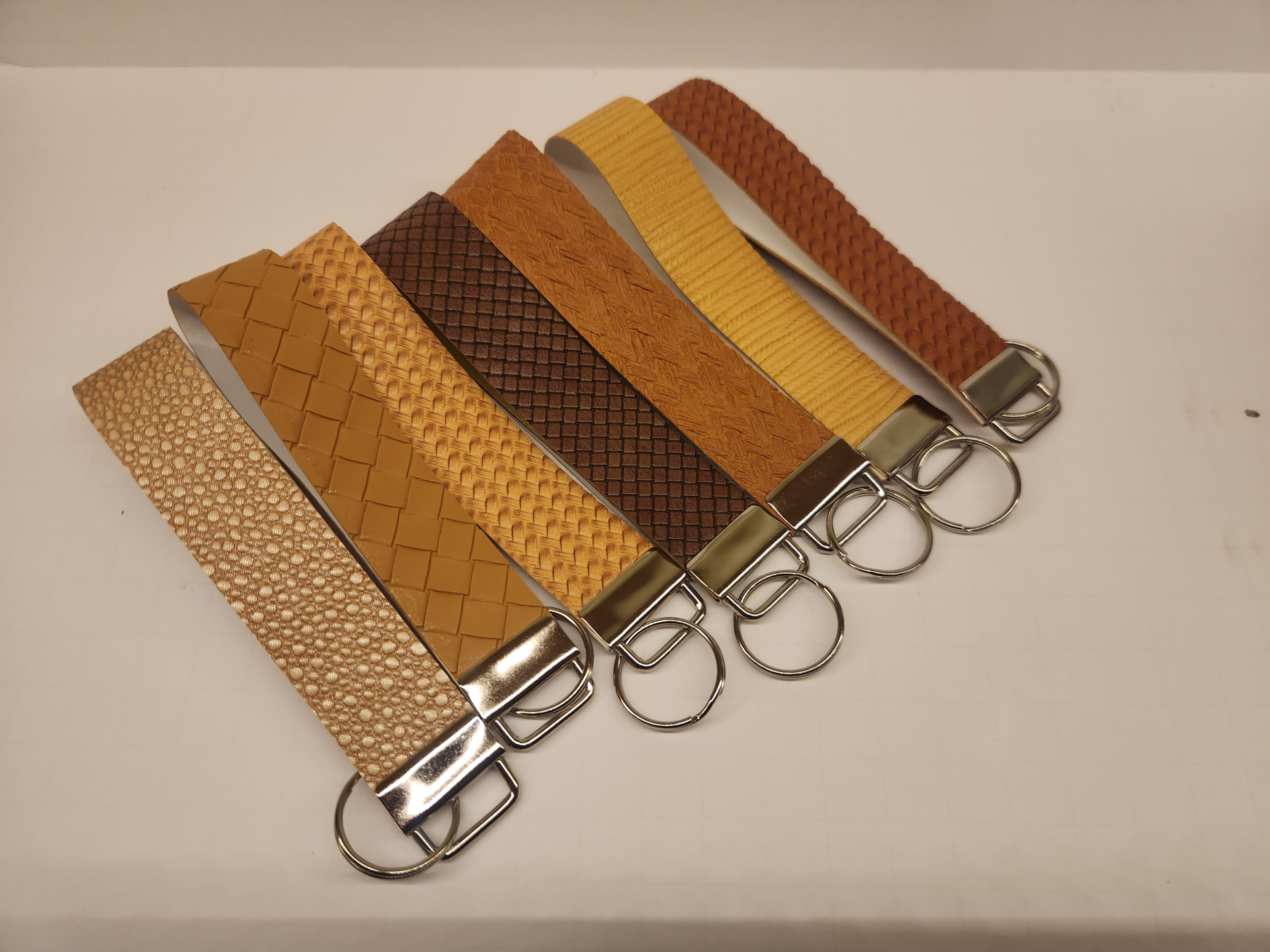 Lineup of Texture wristlets collection showing six different textured designs