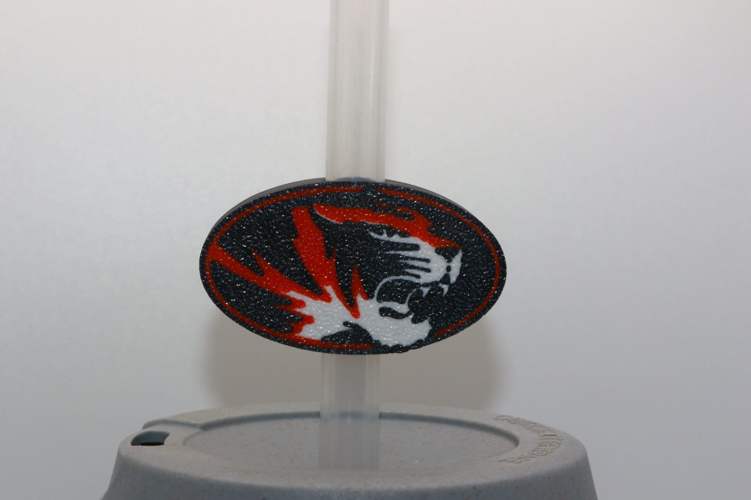 Orange and black straw topper featuring Rising Sun Tigers logo