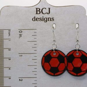 Black and orange soccer earrings showing Rising Sun team colors