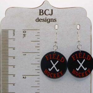 Field hockey earrings with orange and black sticks for Rising Sun High School