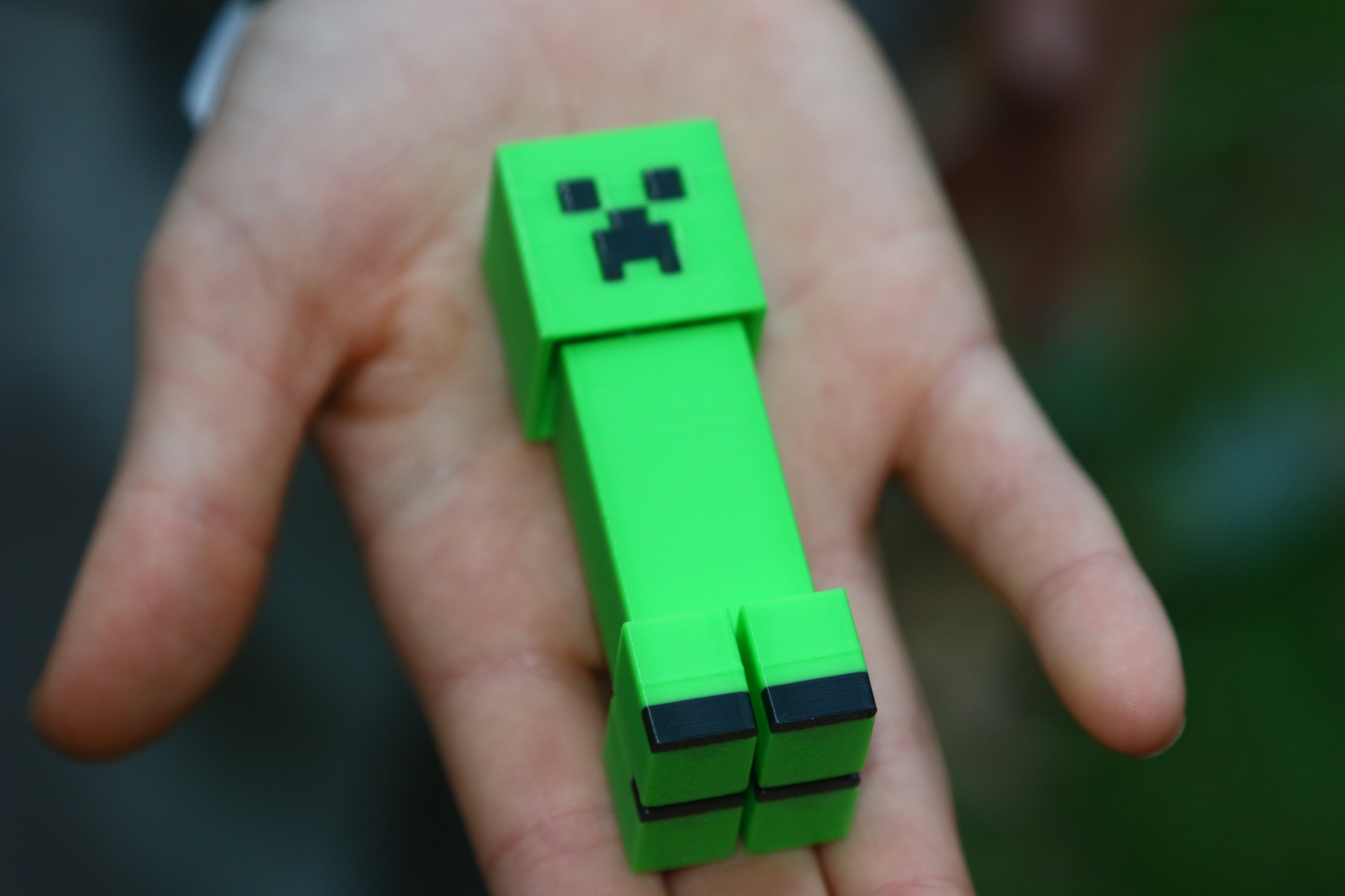 Relieve stress and stay focused with the Minecraft Creeper Fidget — fun, compact, and perfect for gamers.