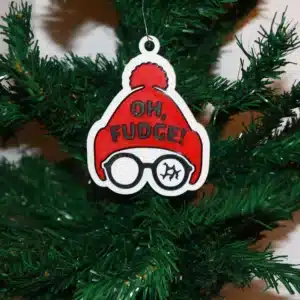 Christmas Story ornament with Ralphie in red hat and broken glasses, text “Oh Fudge.”