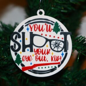 Christmas Story ornament with text “You’ll Shoot Your Eye Out Kid,” glasses as OO.