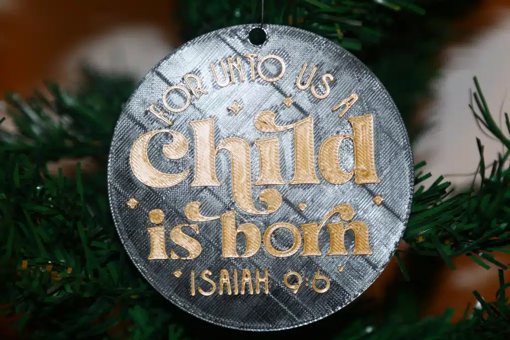Isaiah 9:6 “For Unto Us a Child is Born” Christmas ornament, elegant design.