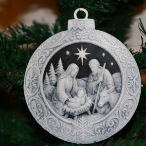 Nativity Scene Christmas ornament with Mary, Joseph, baby Jesus, donkey, trees, and night sky.