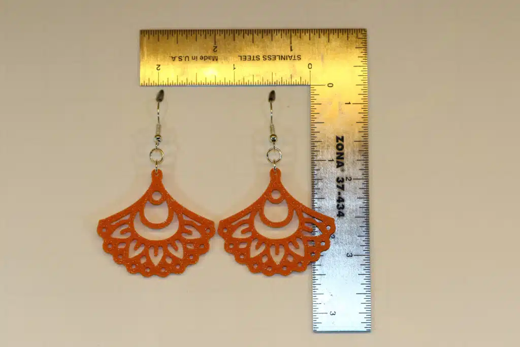 mandala earrings or mandala fan style.