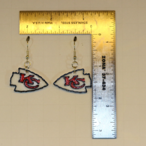Pair of earrings featuring the Kansas City Chiefs logo in red, gold, and white.
