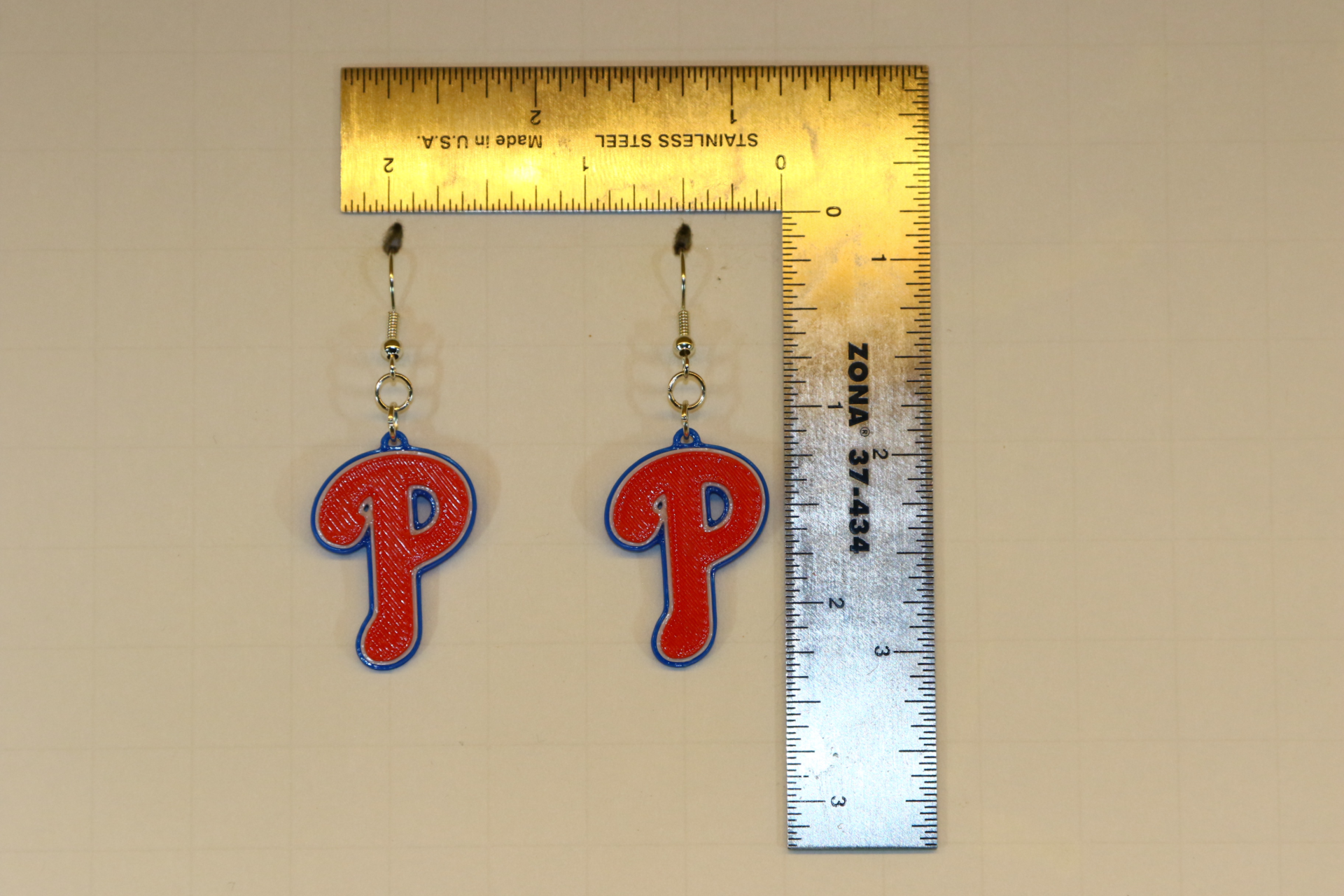 Pair of earrings featuring the Philadelphia Phillies logo in red, white, and blue.