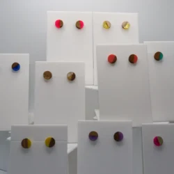 round wood and resin studs on a display