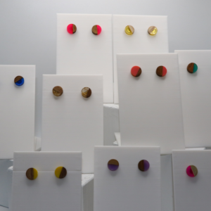 round wood and resin studs on a display