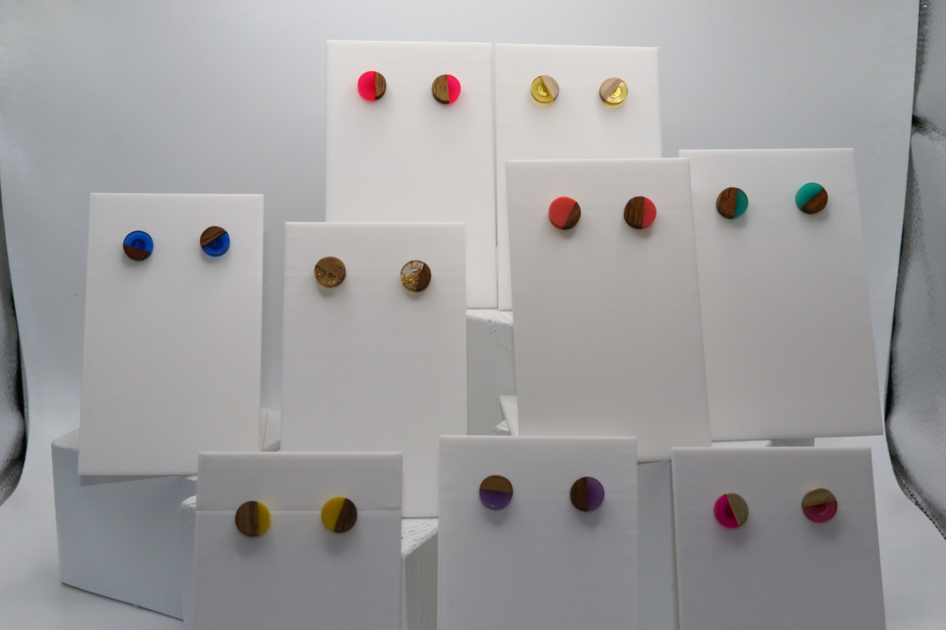 round wood and resin studs on a display