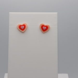 heart stud in a layered color pattern.