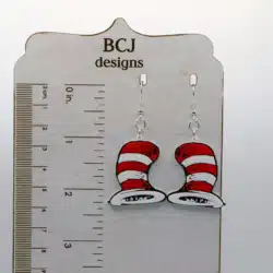 Pair of earrings featuring the Cat in the Hat with red and white striped hats.