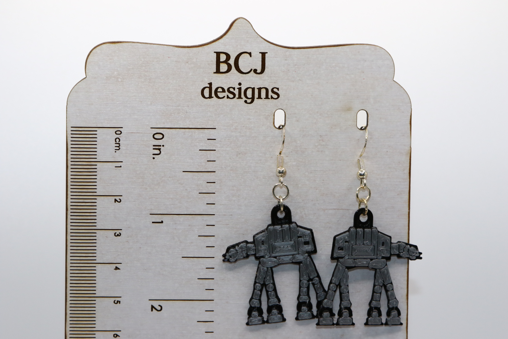 Pair of silver AT-AT walker earrings inspired by Star Wars.